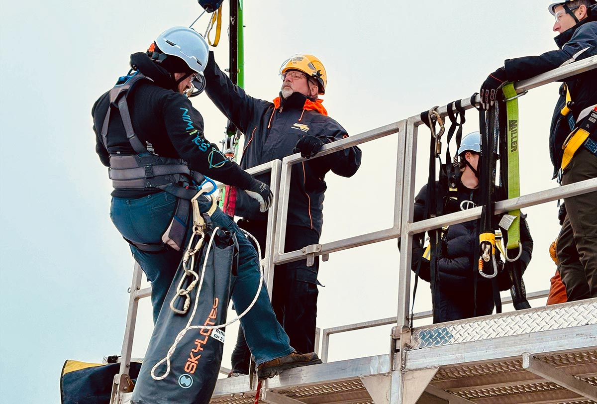 Photo of Soluwin employees with safety equipment